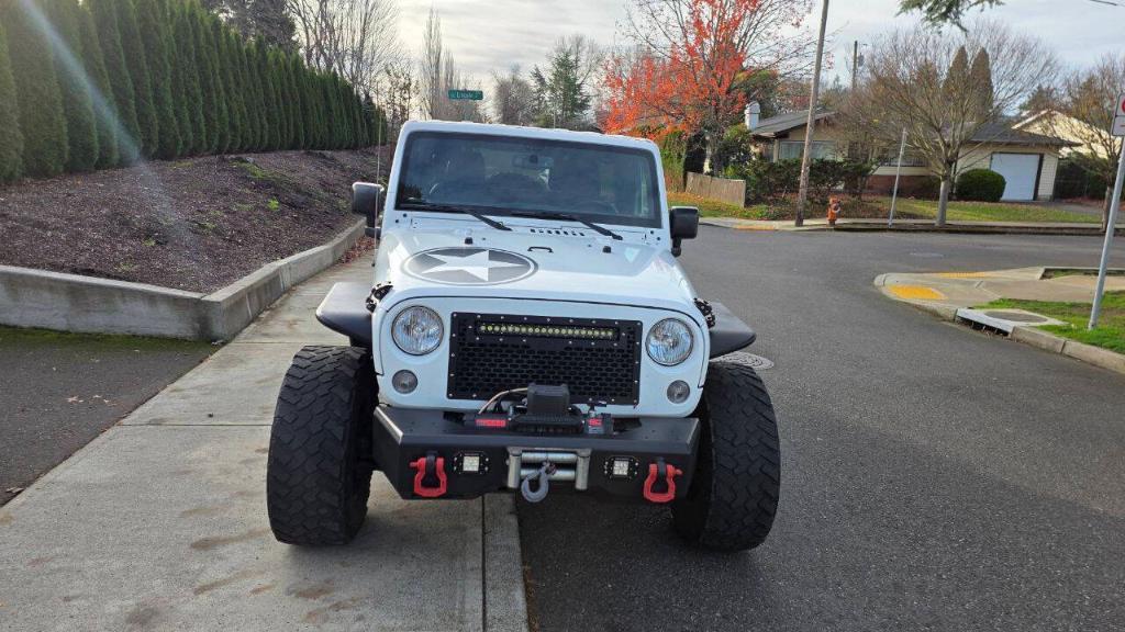 used 2018 Jeep Wrangler JK Unlimited car, priced at $21,995