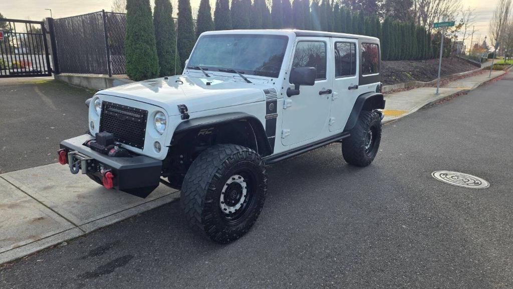 used 2018 Jeep Wrangler JK Unlimited car, priced at $21,995