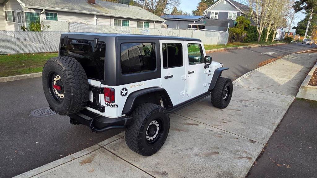 used 2018 Jeep Wrangler JK Unlimited car, priced at $21,995