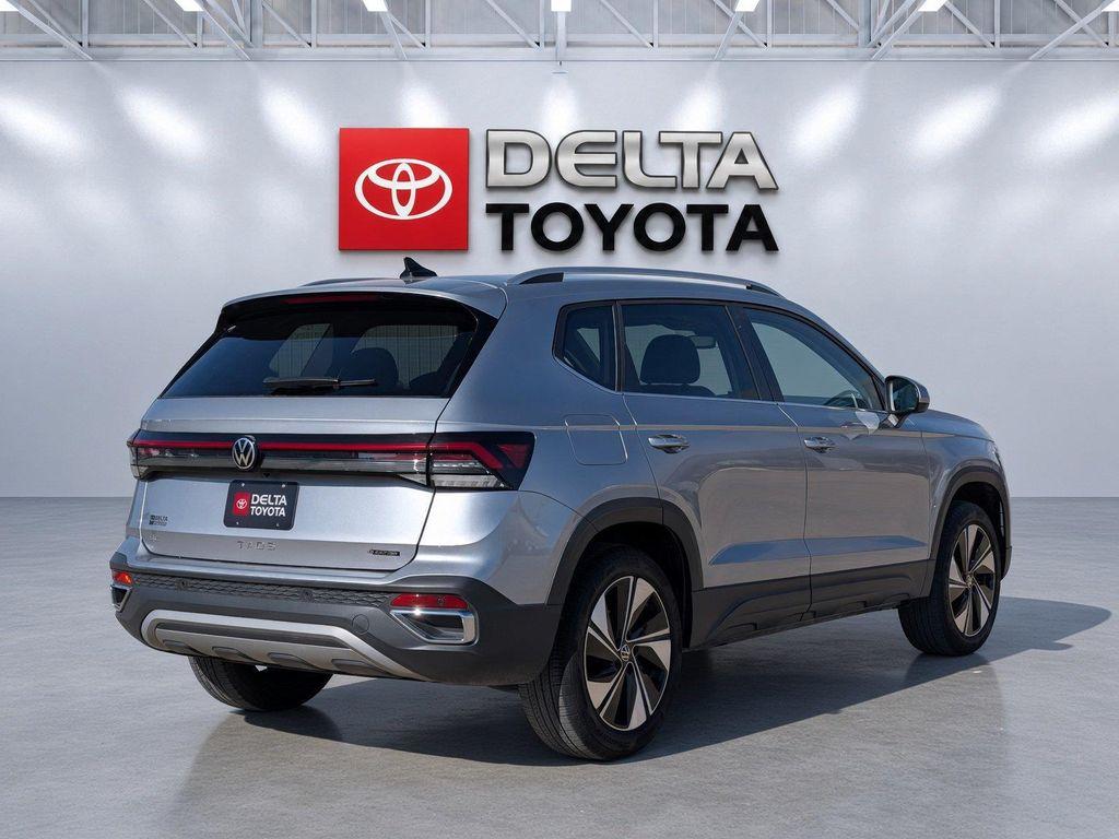 used 2025 Volkswagen Taos car, priced at $23,225