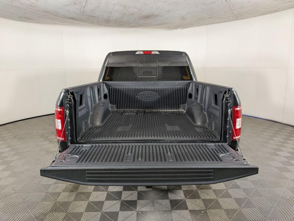 used 2018 Ford F-150 car, priced at $18,488