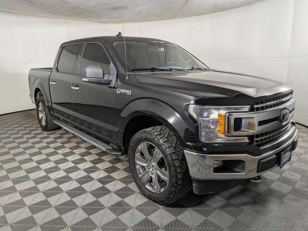 used 2018 Ford F-150 car, priced at $18,488