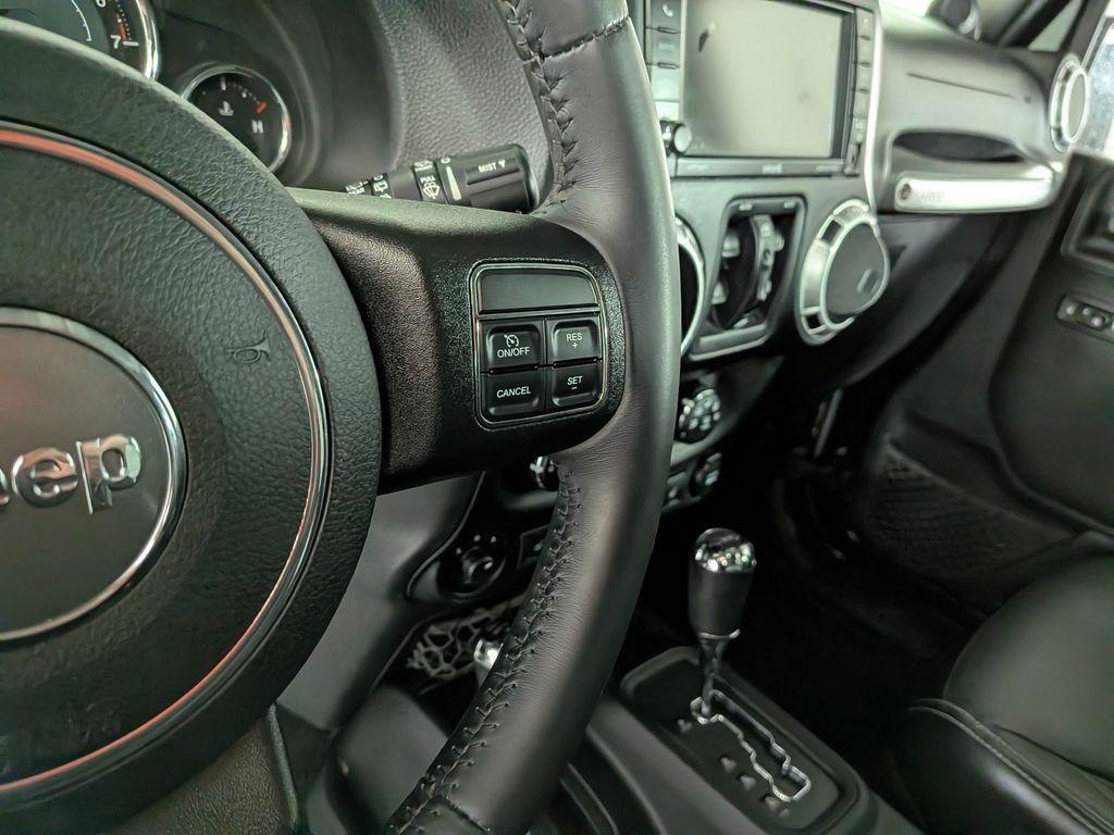 used 2013 Jeep Wrangler Unlimited car, priced at $18,488