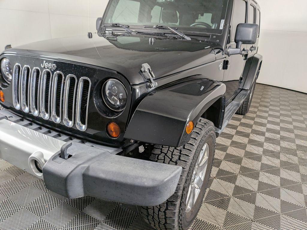 used 2013 Jeep Wrangler Unlimited car, priced at $18,488