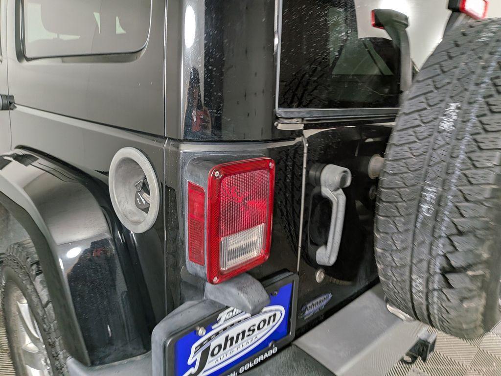 used 2013 Jeep Wrangler Unlimited car, priced at $18,488