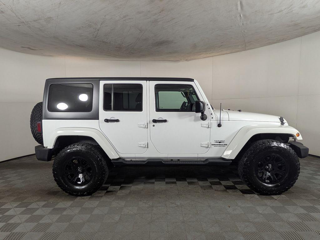used 2015 Jeep Wrangler Unlimited car, priced at $18,488