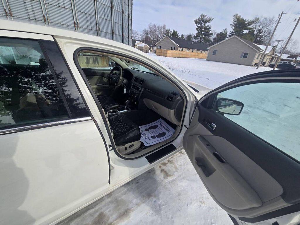 used 2011 Ford Fusion car, priced at $2,395