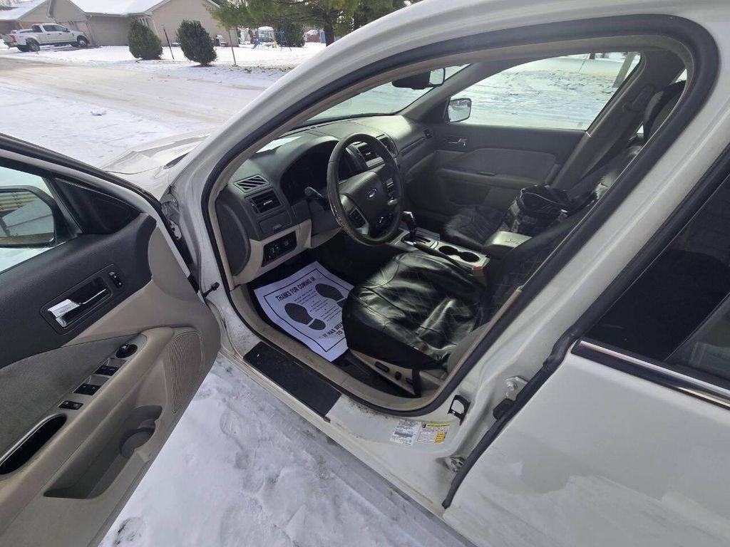 used 2011 Ford Fusion car, priced at $2,395