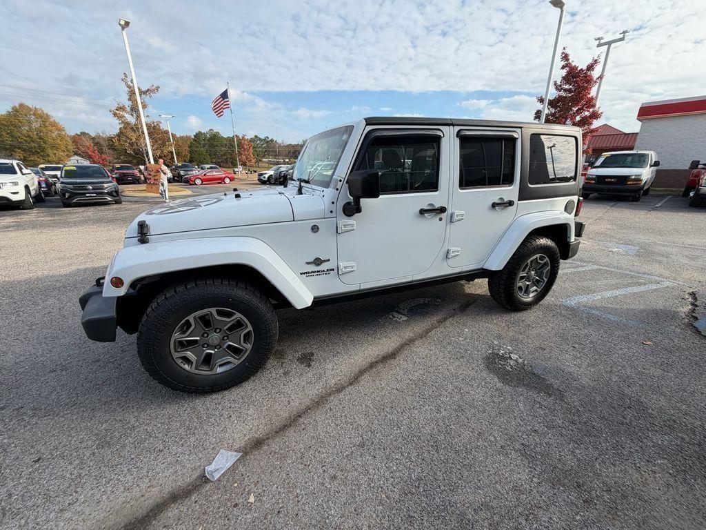 used 2014 Jeep Wrangler Unlimited car, priced at $15,870