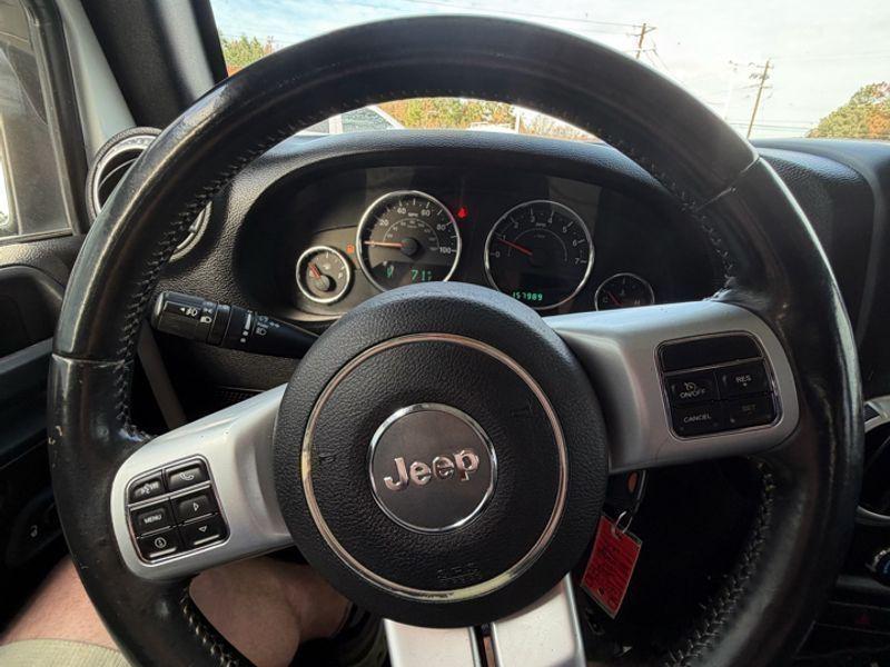 used 2014 Jeep Wrangler Unlimited car, priced at $15,870