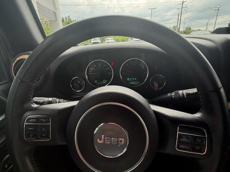 used 2014 Jeep Wrangler Unlimited car, priced at $21,870