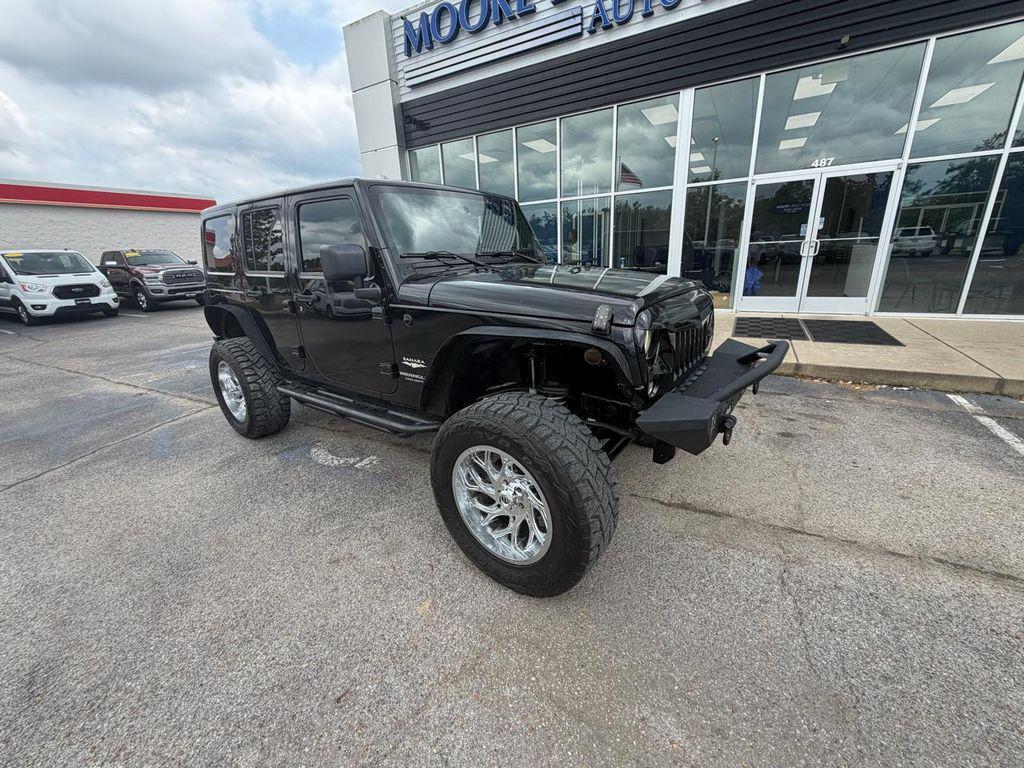 used 2014 Jeep Wrangler Unlimited car, priced at $21,870