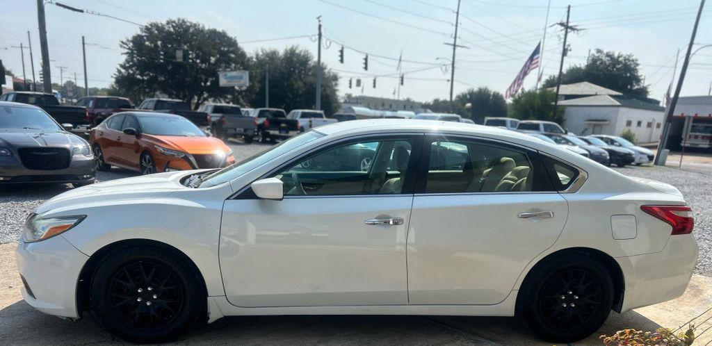 used 2017 Nissan Altima car, priced at $13,990