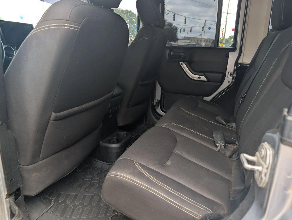 used 2015 Jeep Wrangler Unlimited car, priced at $16,995