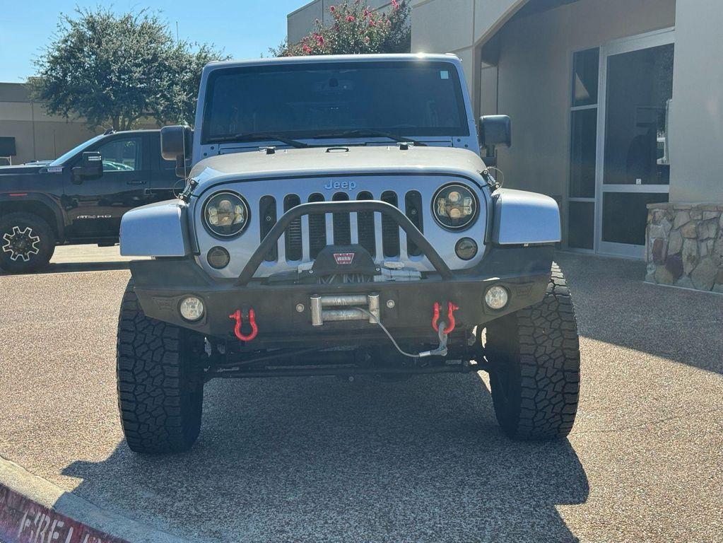 used 2013 Jeep Wrangler Unlimited car, priced at $15,691