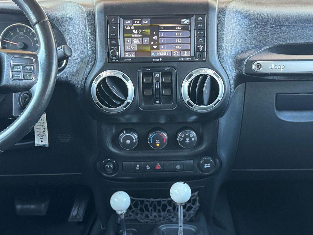 used 2013 Jeep Wrangler Unlimited car, priced at $15,691