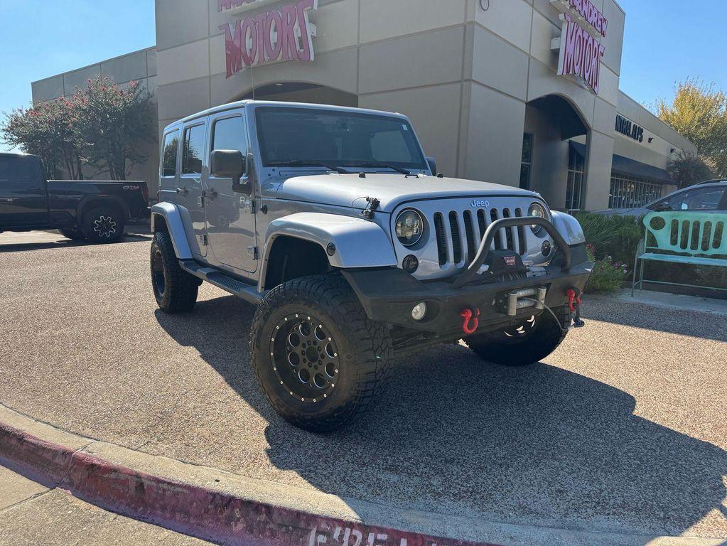 used 2013 Jeep Wrangler Unlimited car, priced at $15,691