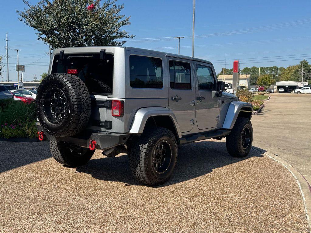 used 2013 Jeep Wrangler Unlimited car, priced at $15,691
