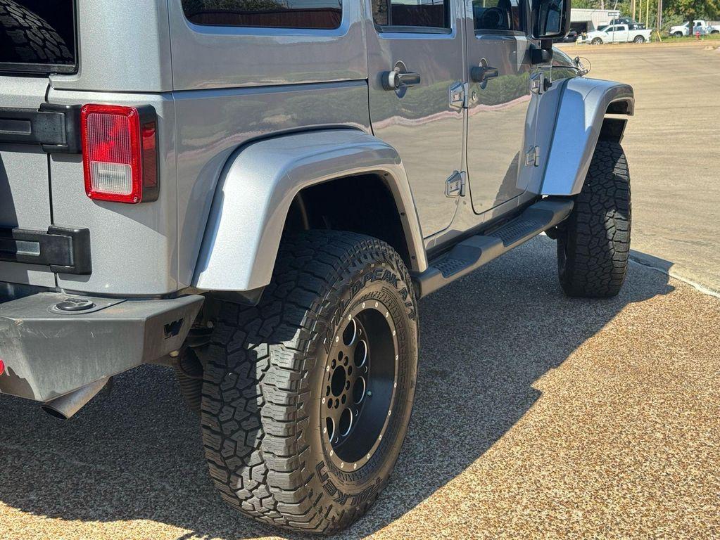 used 2013 Jeep Wrangler Unlimited car, priced at $15,691