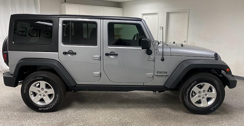 used 2014 Jeep Wrangler Unlimited car, priced at $18,991