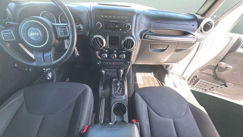 used 2015 Jeep Wrangler car, priced at $15,991