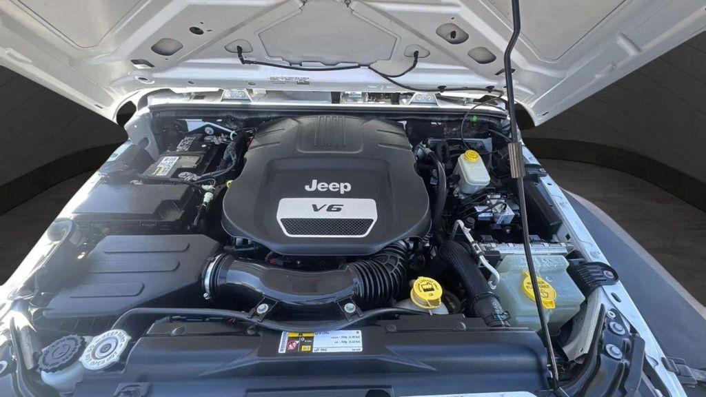 used 2015 Jeep Wrangler car, priced at $13,991