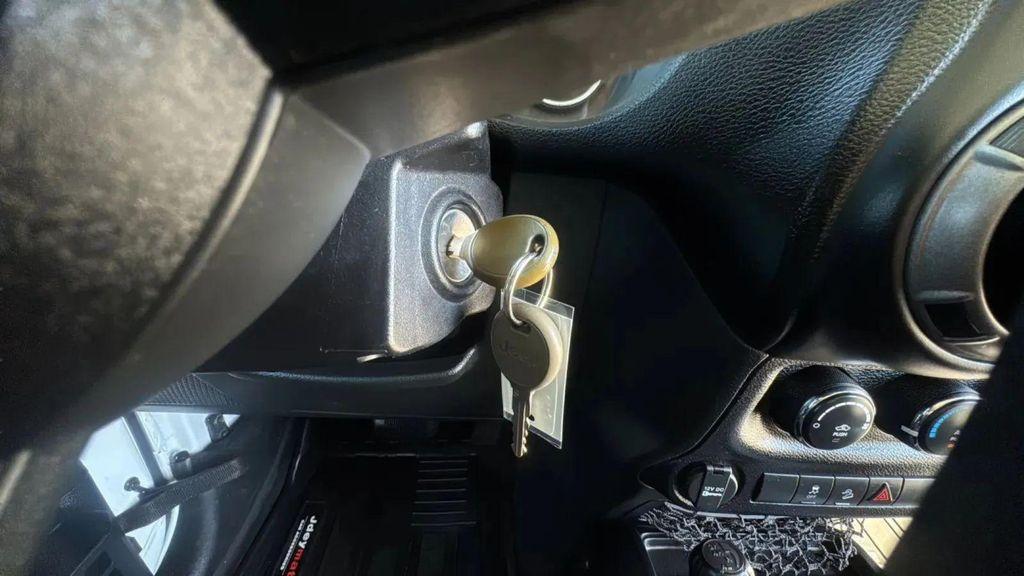 used 2015 Jeep Wrangler car, priced at $13,991