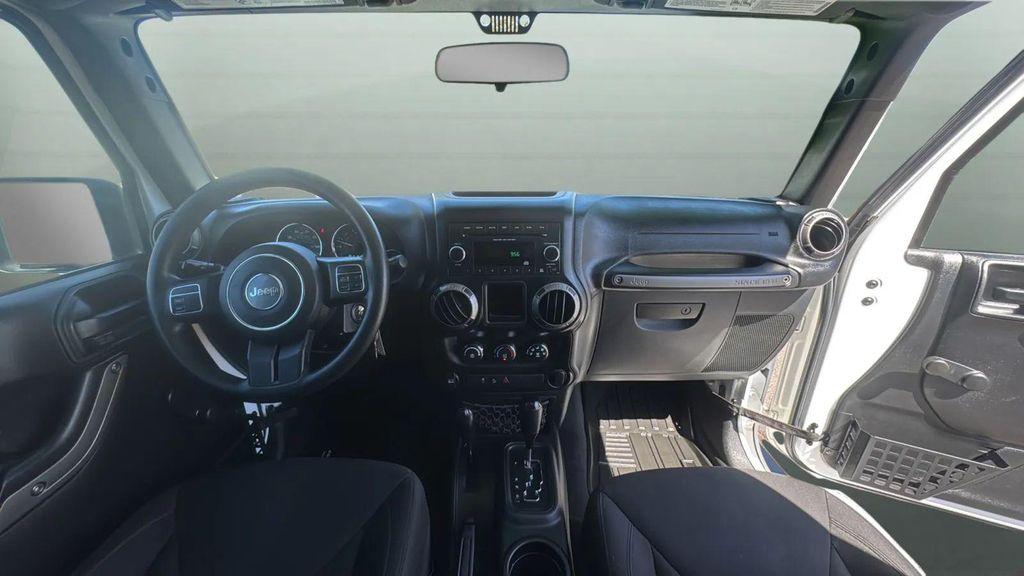 used 2015 Jeep Wrangler car, priced at $15,991