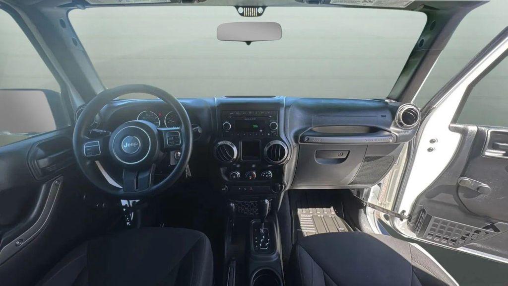 used 2015 Jeep Wrangler car, priced at $13,991