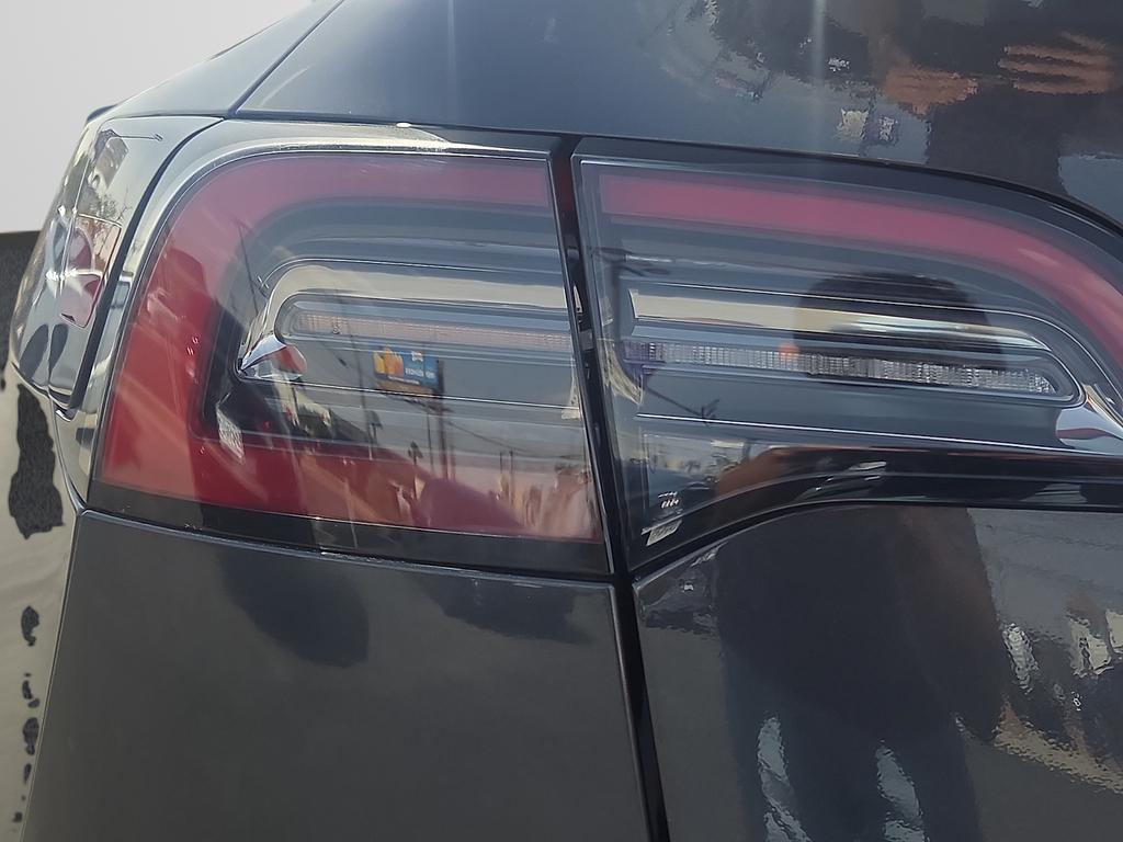 used 2025 Tesla Model Y car, priced at $43,208