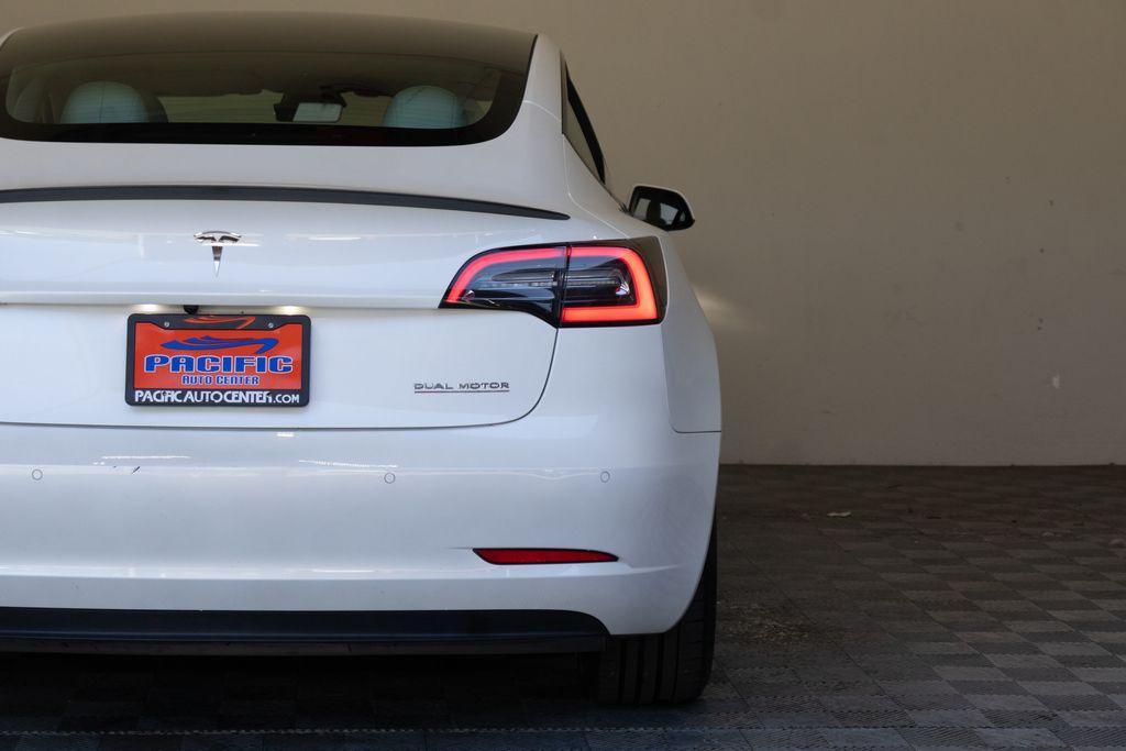 used 2022 Tesla Model 3 car, priced at $28,995
