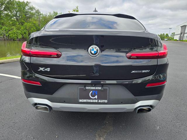 used 2023 BMW X4 car, priced at $37,156
