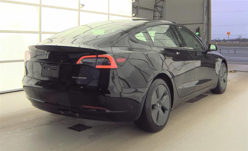used 2022 Tesla Model 3 car, priced at $17,700
