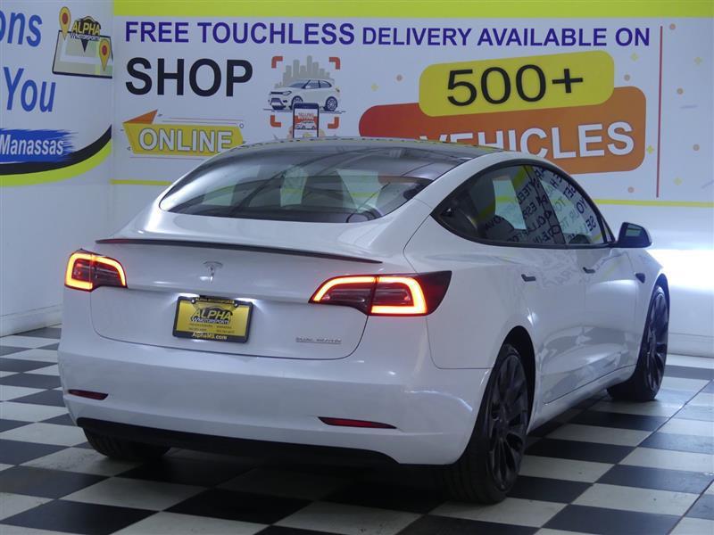 used 2023 Tesla Model 3 car, priced at $31,000