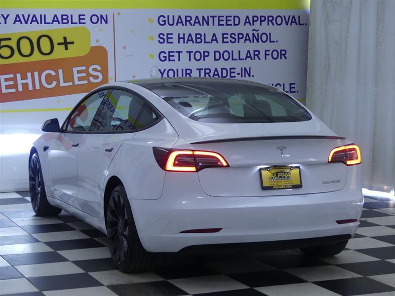 used 2023 Tesla Model 3 car, priced at $31,000
