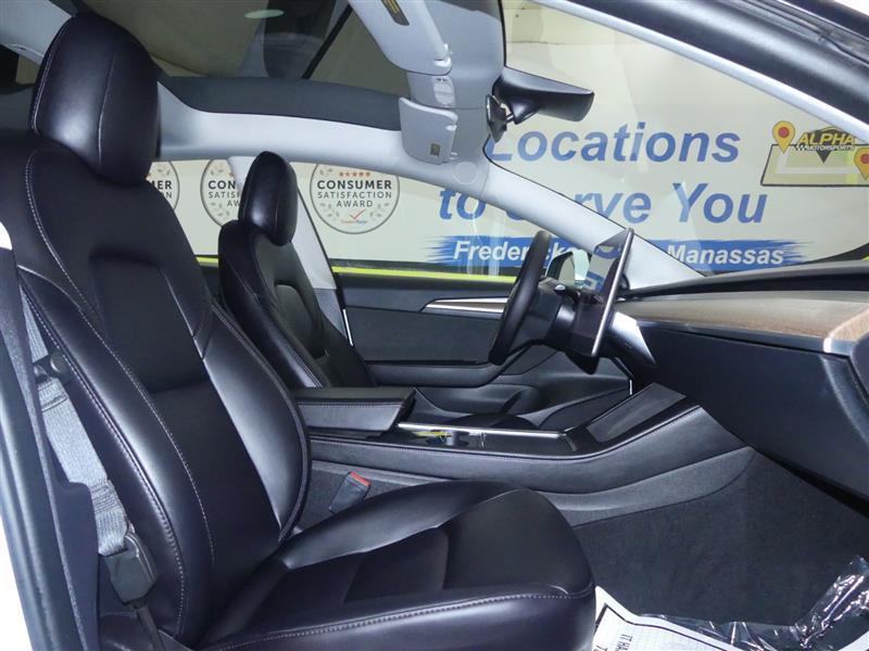 used 2023 Tesla Model 3 car, priced at $31,000