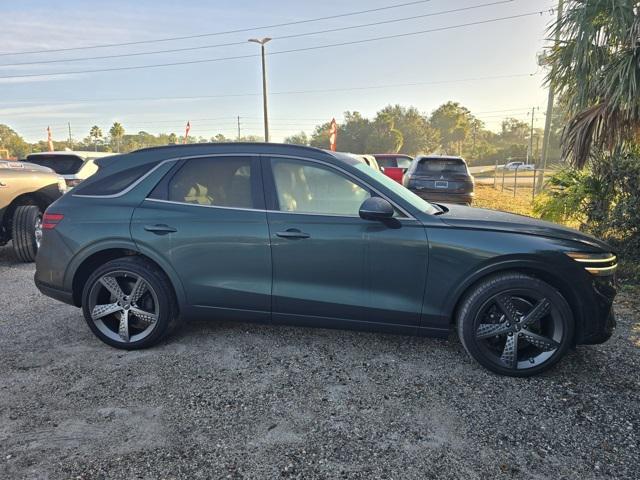 used 2023 Genesis GV70 car, priced at $42,700