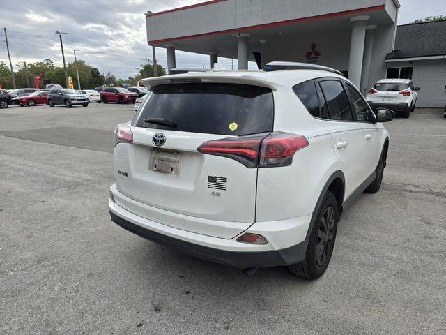 used 2018 Toyota RAV4 car, priced at $13,000