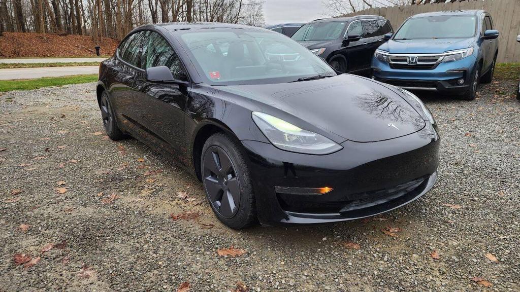 used 2023 Tesla Model 3 car, priced at $21,895