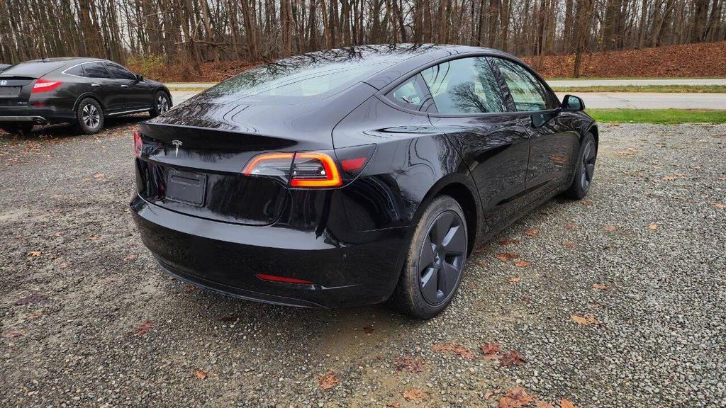 used 2023 Tesla Model 3 car, priced at $21,895
