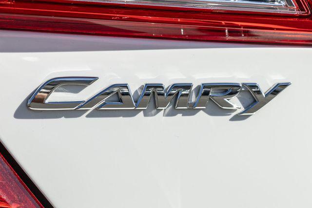 used 2013 Toyota Camry Hybrid car, priced at $13,999