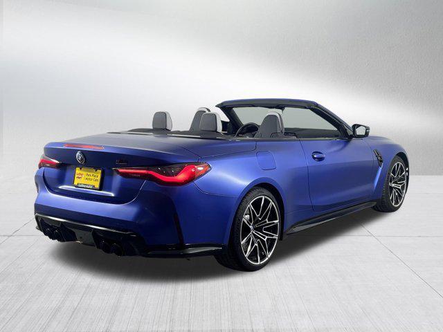 used 2022 BMW M4 car, priced at $70,000