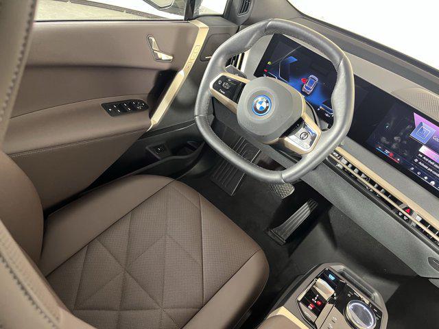 used 2025 BMW iX car, priced at $67,198