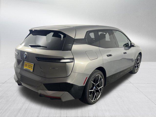 used 2025 BMW iX car, priced at $67,198