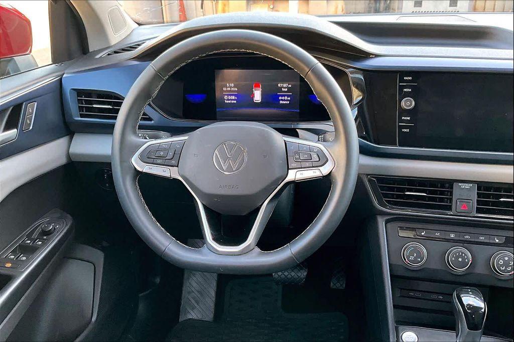 used 2022 Volkswagen Taos car, priced at $15,300