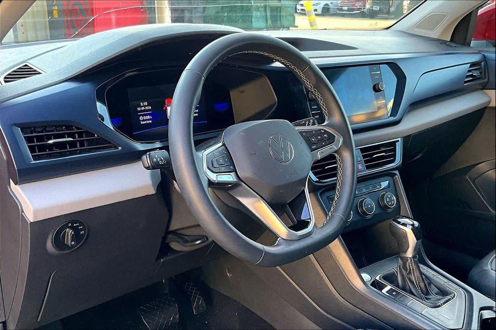 used 2022 Volkswagen Taos car, priced at $15,300