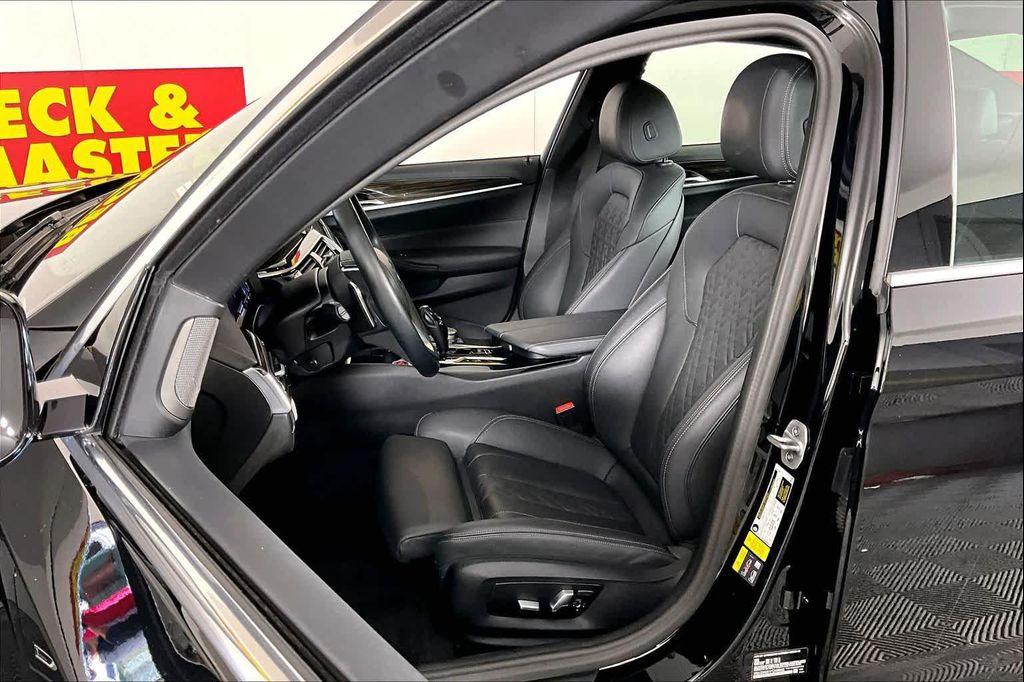 used 2023 BMW 530e car, priced at $29,284