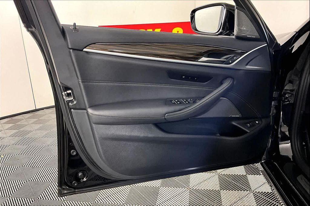 used 2023 BMW 530e car, priced at $29,284