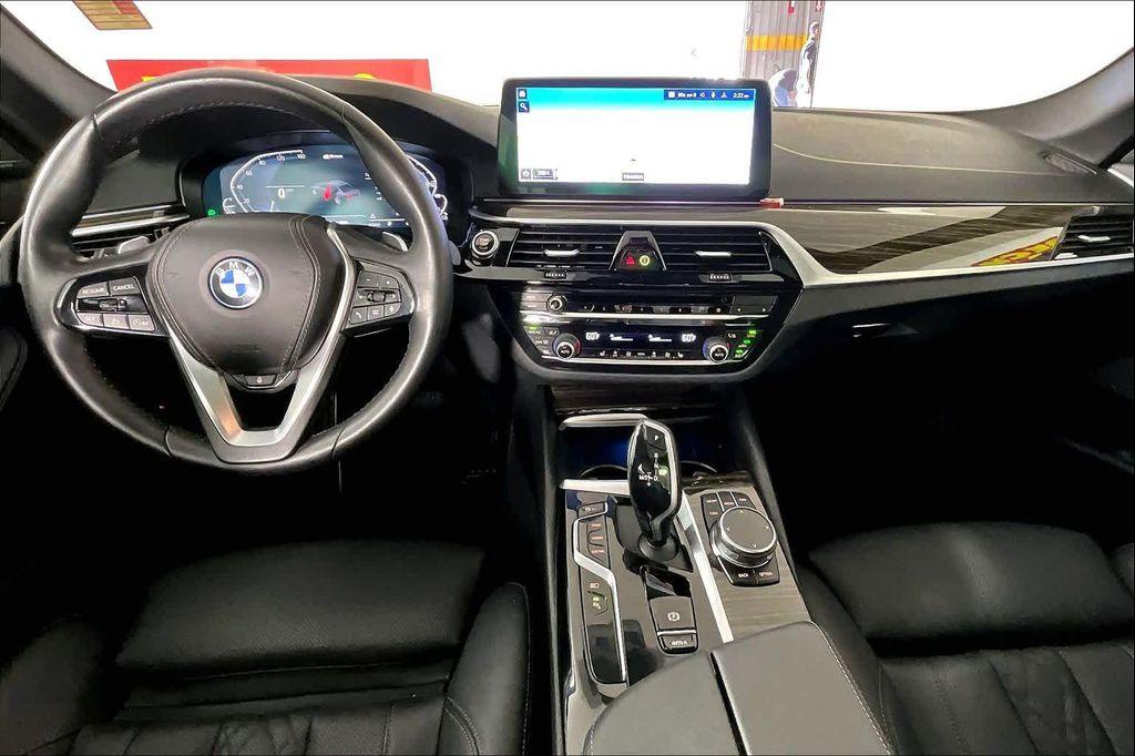 used 2023 BMW 530e car, priced at $29,284