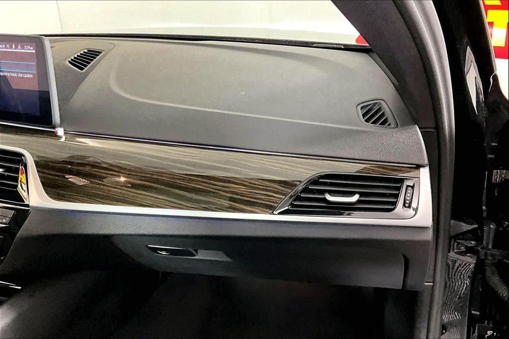 used 2023 BMW 530e car, priced at $29,284